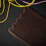 Rubber Band Leather Board by TCC Presents
