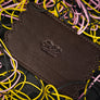 Rubber Band Leather Board by TCC Presents