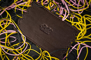 Rubber Band Leather Board by TCC Presents